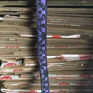 Purple and black checkered belt